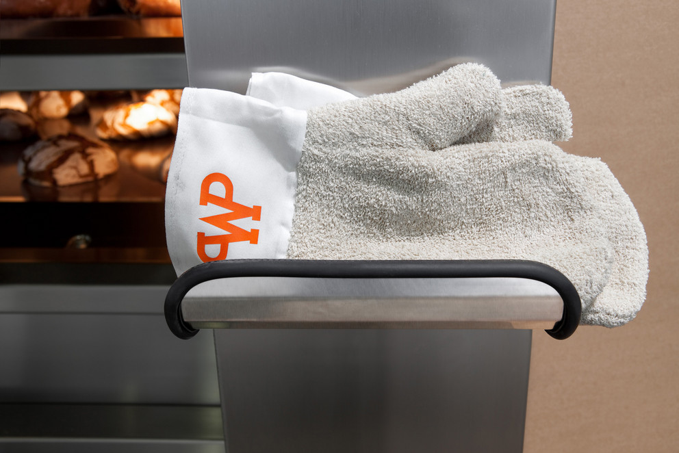 Glove rack on the oven Gloves on glove rack on the oven MATADOR